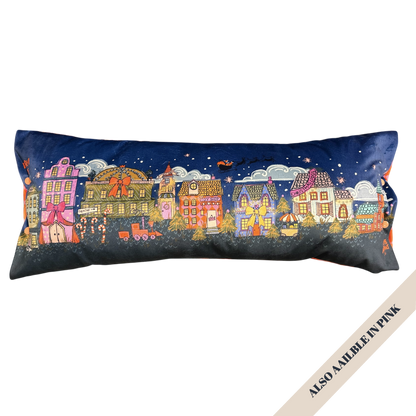 North Pole village reversible "naughty but nice" bolster pillow.