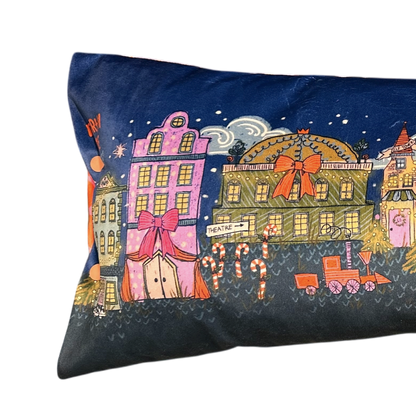 North Pole village reversible "naughty but nice" bolster pillow.